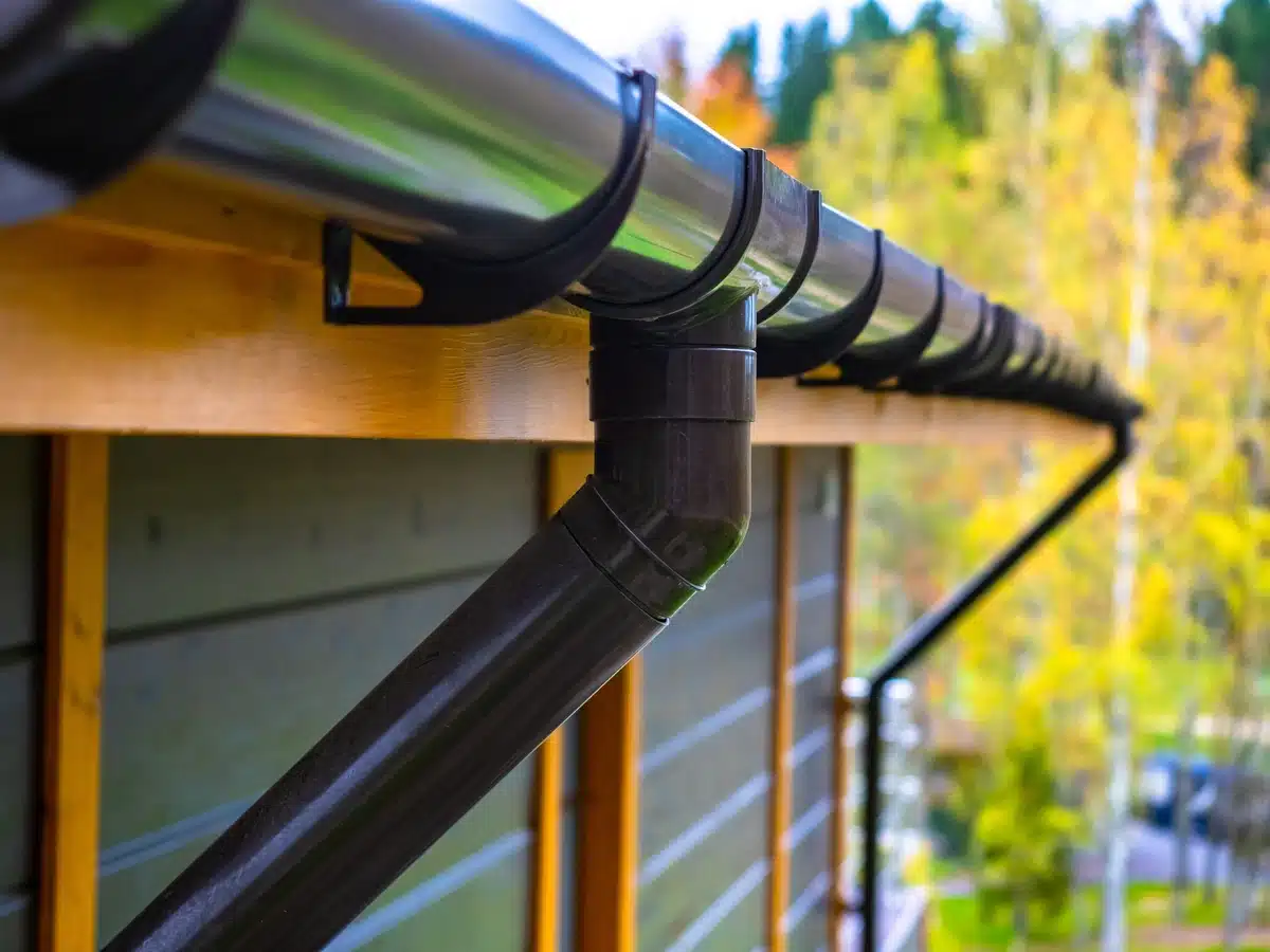 black gutter system on roof