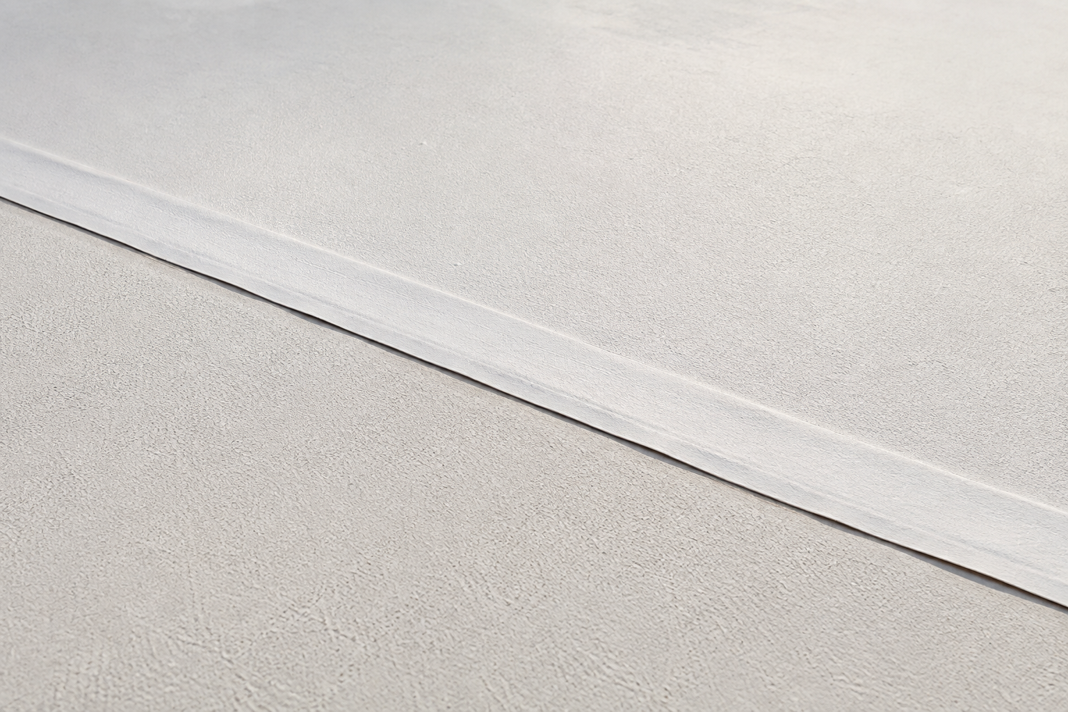 White TPO roof membrane with welded seams