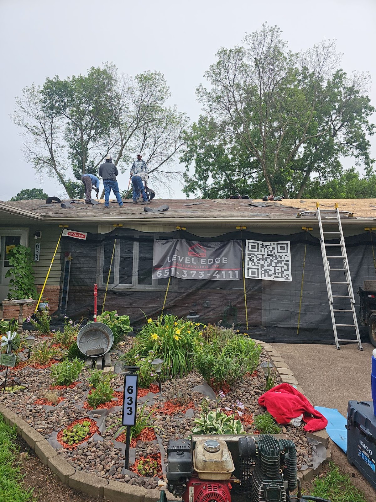 Level Edge crew working on a residential roof